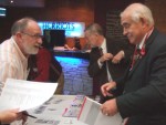and here giving a conference pack to Lancashire County Councillor Keith Young, Cabinet Member responsible for Transport