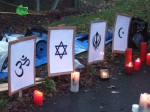 A variety of affiity groups took responsibility for different gates, there being a total 9 gates to Aldermaston Weapons Establishment (AWE). Tadley Gate was primarily for faith groups. Here a variety of candles & symbols on the ground representing different faiths