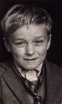 Roger b. 1941 was four years older than me and was the closest in age
3 of us went to the local Grammar School, Ilford County High School and the first day when I answered to my name the teacher responded, 'another scruffy one!'. Here Roger poerfectly illustrates that adjective but he's got a cheery grin