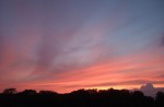 there was a beautiful sunset with a jagged mountain-like cloud