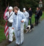 in conversation en route and another dog enjoying the protest