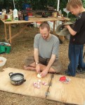 I so wish I could sit like that!
Gabriel chopping veg for the meal with his trusty Swiss army knife (not ideal but at Summer Camp we muddle through)