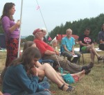 Bek telling us about the arrangements for childcare and the need for volunteers; indeed, many of the camp's facilities and activities depended on voluntary effort so we all played our part