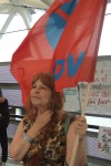 and a protester with a flag