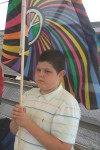 a local lad also with a flag