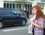 Once again on Thursday, the last day of DSEi, a dinner was held for the Arms Dealers. Here, a demonstrator with her placard entitled 'Stop Killing My Friends' pointed at the luxury cars passing by.