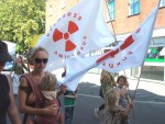 this family was on the march with Remember Fukushima flags