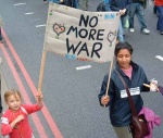 Apparently the BBC news said there were only a few thousand on the march, I was stood in the same place on Park Lane for 2 hours taking photos as the march passed, there were many more than a few thousand, march organisers estimated 100,000; once again the BBC downplays the peace movement

here, this child's protest says it all