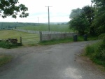 86. looking east at the bend on Booth Bridge lane from the former level crossing