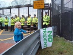 The Big Blockade of Trident Nuclear Submarine base, 23rd August, 2004 
- 2 Scandinavian women swam into the base while 76 people including 4 members of the Scottish Parliament were arrested in the blockade outside. Security was also breached at the Coalport nuclear weapon store. 

Here my grandson Orrin with a clear message