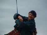 dangling on a rope - one of the intrepid climbers - more of the climbers further on