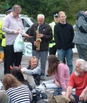 a saxophonist bringing some music to the event