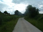 7. looking south-west on the farm road at Church lane bridge. The road bends right to join Church Lane north of the bridge