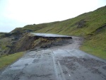 a gap near the top where the tarmac has slid away 