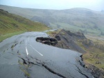 If you think the pot holes in your street are bad, then take a look at the old A road that skirts Mam Tor in Derbyshire. Mended many times, it was finally abandoned about 20 years ago.
Now the only traffic is walkers and cyclists.
This photo shows that the edge of the mountain is sliding and taking the road with it