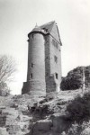 The building turned out to be a delapidated tower with holes for pigeons or doves. The woods turned out to be rhodedendron bushes and they covered a vast area of hillside. Amongst this overgrown neglected jungle were attractive Mediterranean stone arches, shelters, a multiplicity of paths and steps galore, two lakes and even a track spanned by a huge bridge. It seemed like we were the first explorers ever to discover it and that was purely by chance.