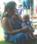 Kerris & Aelwyn keeping cool in the tent kindly provided