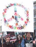 Tens of thousands marched through the streets of London to encourage MPs to say NO to the spending of �25 to �75 billion on the renewal of Britain's nuclear submarine fleet with its hideous weapons of mass destruction.
here, a colourful CND peace sign made up of handprints