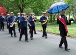 the band marching up to the Festival site in front of Townley hall