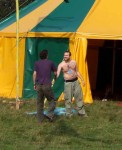 a welcome handshake as people arrive to set up the event
