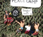 some splendid protest by action men outside the Faslane Peace Camp area