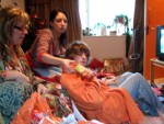 christmas day was at alison's this year - here, bubs passing presents out