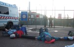 and here at the same gate a lock-on, activists locked on to each other with tubes making it hard for the police to seperate them