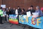 some of those gathered opposite the embassy