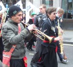 and a trumpeter blowing away