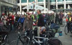 Dan, the one with the jester hat, both assists Tim pedalling the tandem and looks after the sound system