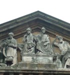 the two middle figures are Lancashire cotton spinning) on the left and Yorkshire (engineering and agriculture) on the right and the historic boundary goes straight down from the apex. 
In the Town Hall ballrom great fun was had dancing from Lancashire into Yorkshire and visa versa